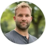 Testimonial headshot of Specialty Surfaces owner displayed in a circular portrait with transparent background for website review section