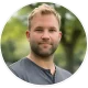 Testimonial headshot of Specialty Surfaces owner displayed in a circular portrait with transparent background for website review section